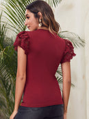 Blusa de manga borboleta