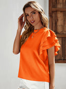 Blusa manga em camadas