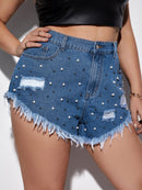 Short jeans com aplicação