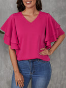 Blusa manga de borboleta