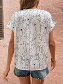 Blusa figura abstrata