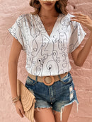 Blusa figura abstrata