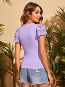 Blusa de manga borboleta