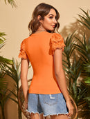 Blusa de manga borboleta