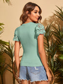 Blusa de manga borboleta