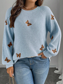 Tricô com bordado borboleta