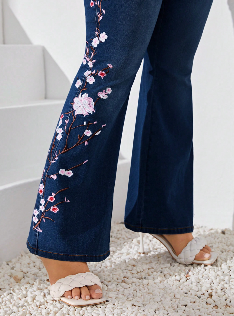 Calça jeans flare Bordado floral